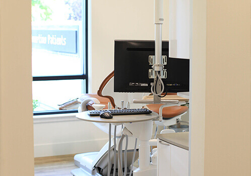 Mountain Home Dentistry Co. uses modern technology to save your smile One of our treatment rooms with a computer monitor in it